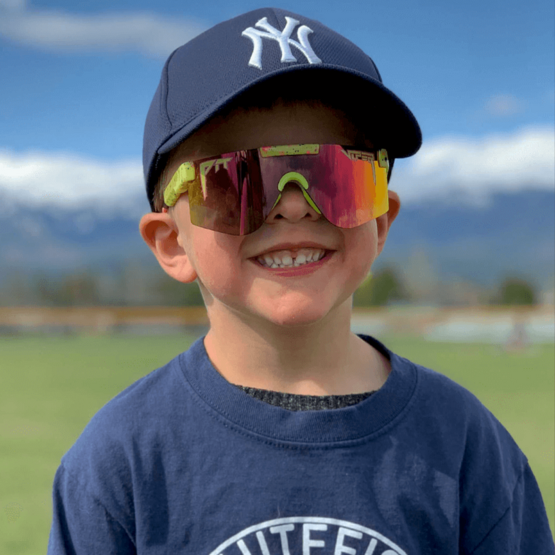 / Rainbow | butter_noodle.JPG | Kid in a baseball hat wearing The 1993 XS from Pit Viper Sunglasses