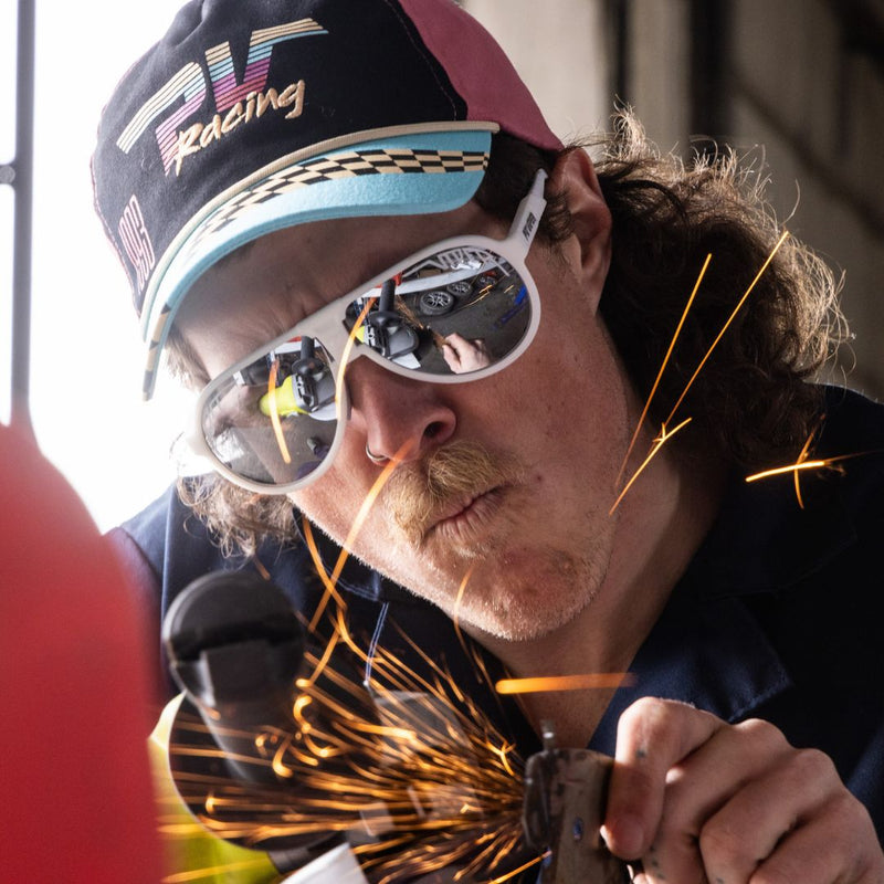 / Polarized Silver | computer.JPG | A man welds while wearing The Miami Nights Jethawk with a from Pit Viper Sunglasses