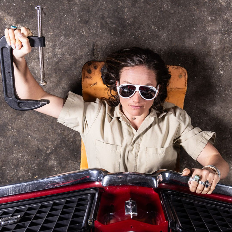 / Polarized Silver | image.JPG | A women faces upward wearing The Miami Nights Jethawk  from Pit Viper Sunglasses