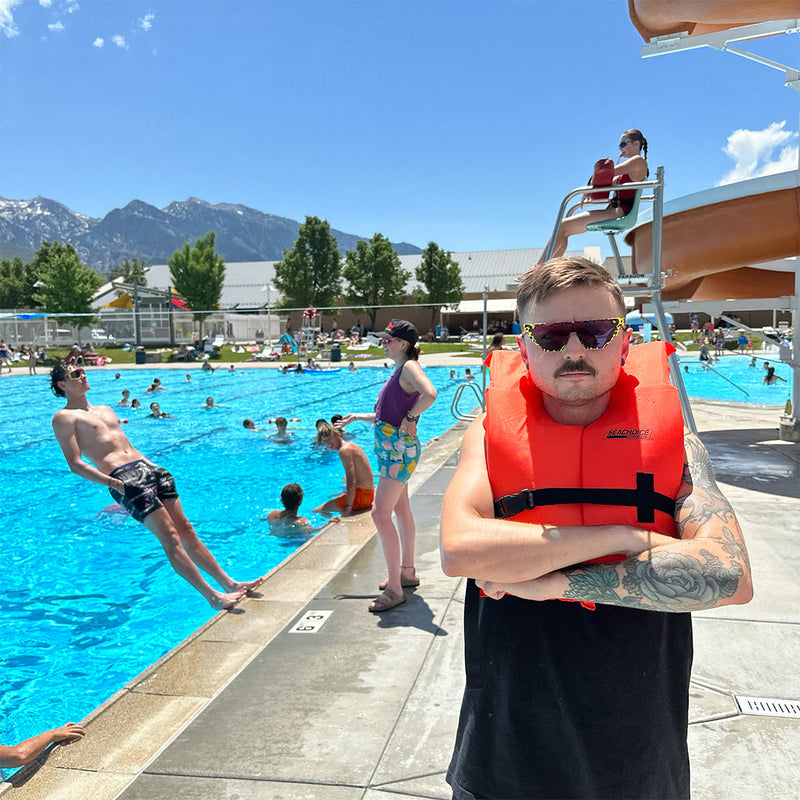  | files.JPG | Man wearing a life jacket and The Carnivore Showroom from Pit Viper Sunglasses