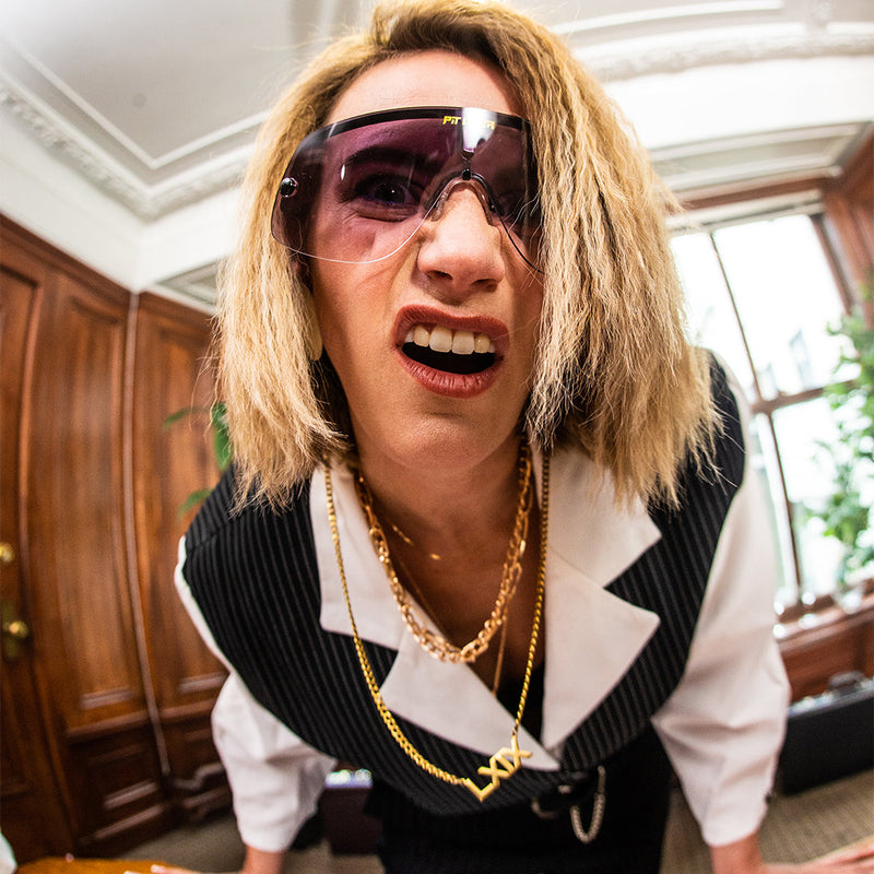 / Polarized Smoke | thats_why_i_took_all_these_photos.JPG | Woman making a face at the camera in The Exec Limousine from Pit Viper Sunglasses