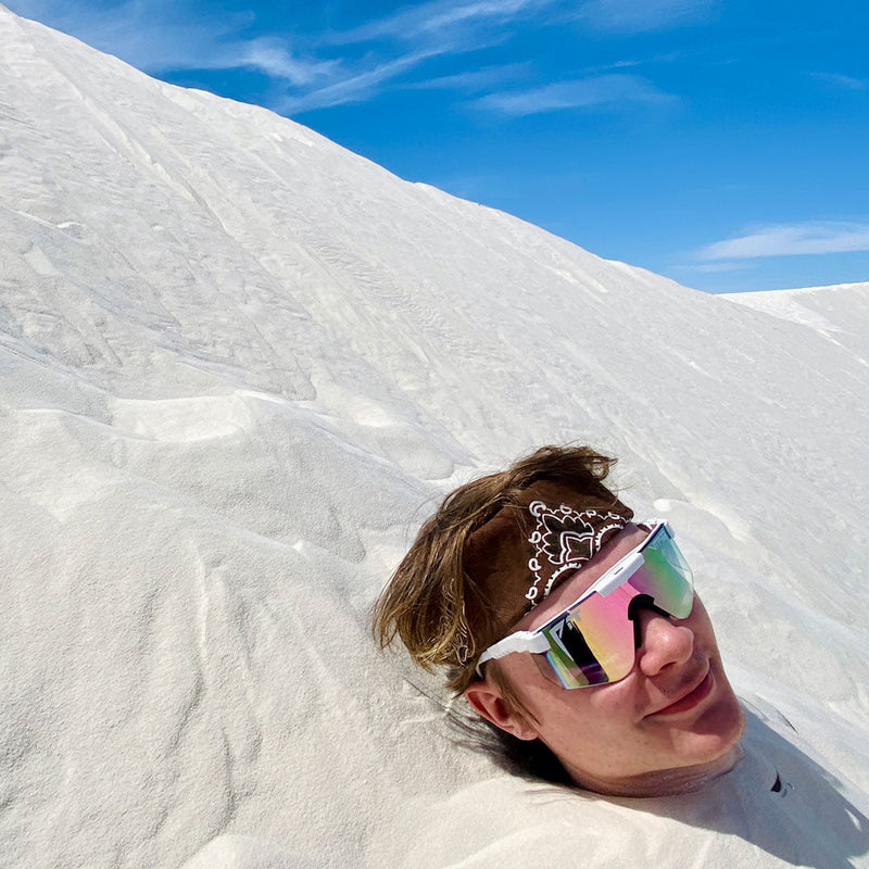 Wide / Pink | beep.JPG | Man in the sand wearing The Miami Nights Original from Pit Viper Sunglasses